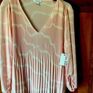 Nine West pink and white airy, long sleeve, accordion style top.